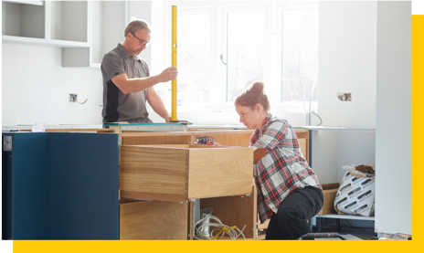 kitchen installers working on units